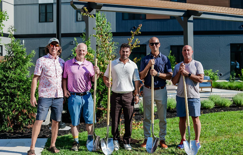 Reveler Development plants a tree for grand opening of The Eddy